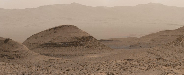 An ochre toned image capturing a Martian landscape.