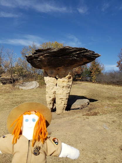 Ranger Sarah has found a mushroom rock. The sandstone and sedimentary rock are held together by calcium carbonate, which acts as a natural cement.
— at Mushroom Rock State Park.